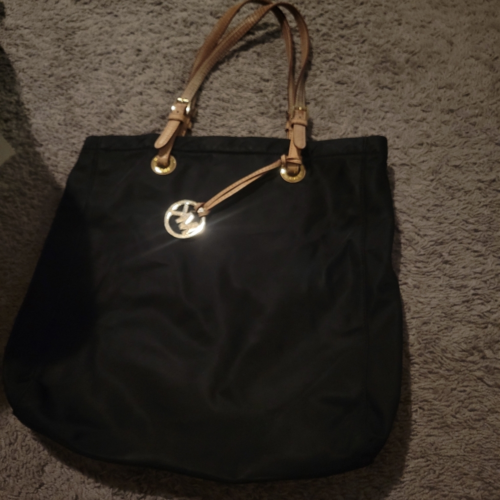 Chic Black Tote Bag with Gold Accents